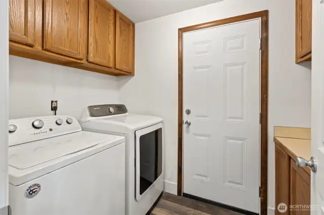 Laundry room and brand new fire safe door to 3 bay garage