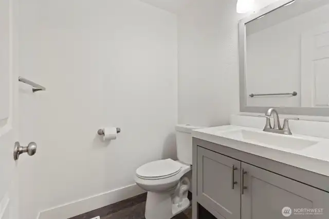 Half bath on main floor for guests and entertaining.