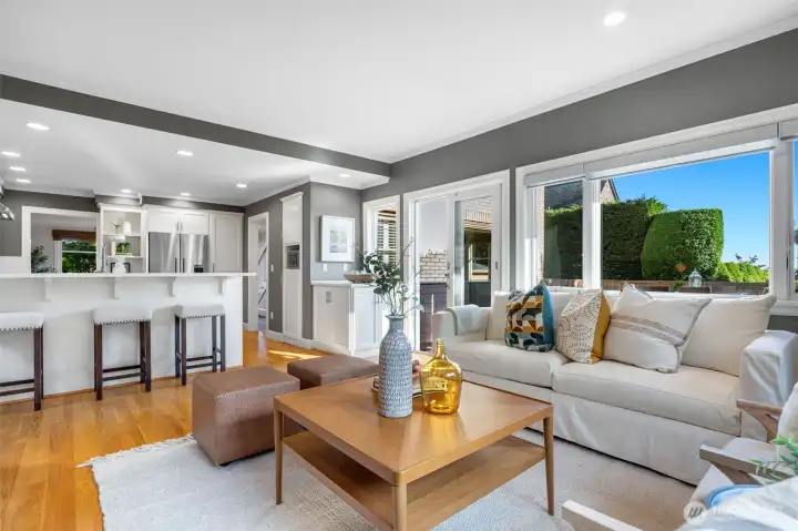 The family room also opens to the back patio via a glass door- again- great flow!  This is such a comfortable space and a perfect spot for the main floor tv.