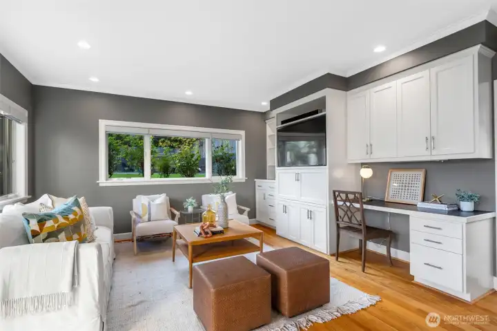 This family room was an addition, and what a huge bonus this space is- it's the heart of the home! Notice that from this room, and from the kitchen, you have a view of the back yard-- ideal for keeping an eye on little people and pets.