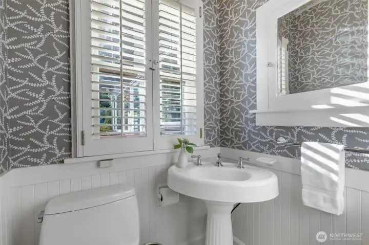 This super charming powder room is off the main floor hallway.