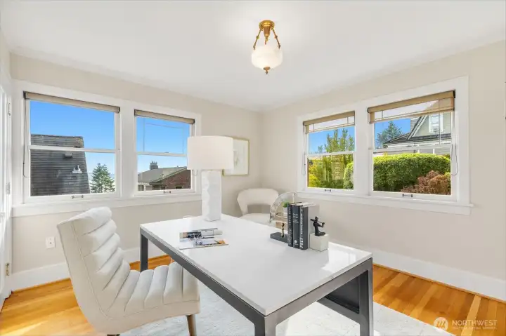 An inspiring office, with tons of natural light and views over the yard and the water.