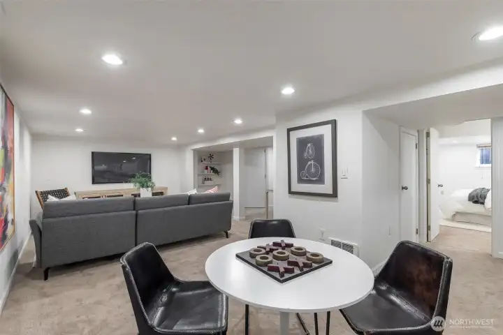 The space is large enough that it can be multiple things- media and game room.  There is tons of storage here as well, with a whole wall of closet behind us.