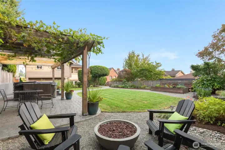 This fire pit is a favorite gathering spot, and there is even a bit of Space Needle view from here!