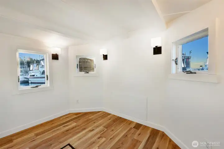 There are three hatches for extra storage under the luxury vinyl plank flooring.