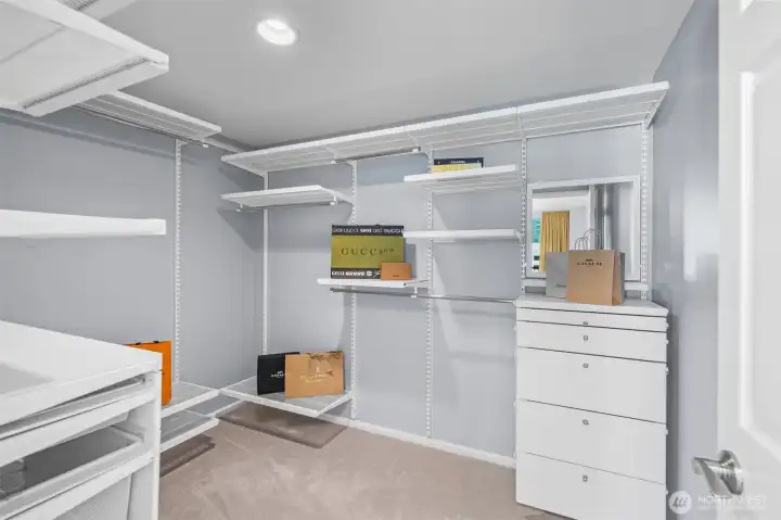 Primary Suite with Custom Closets: