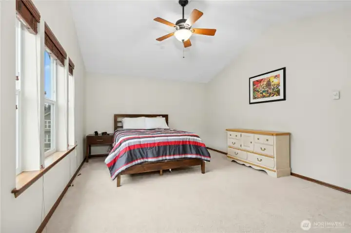 Expansive primary suite with abundant natural light and room to truly unwind.