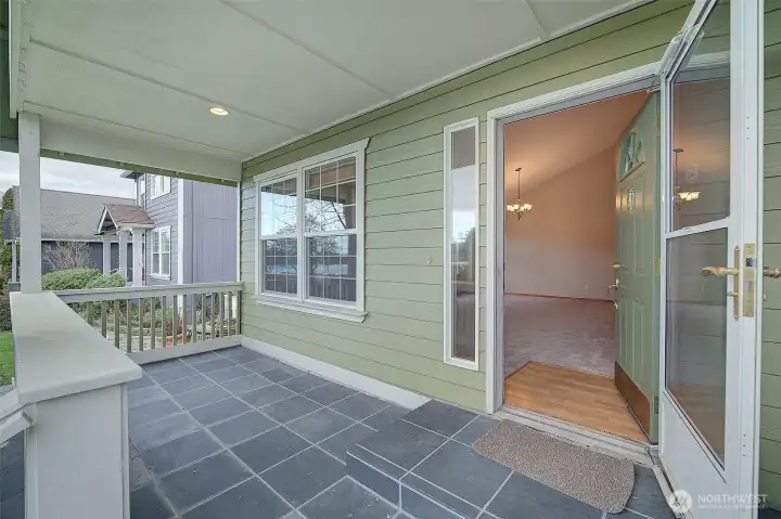 Welcome home! Front entry porch is perfect for watching the sunset over Lords Lake and waterfowl.