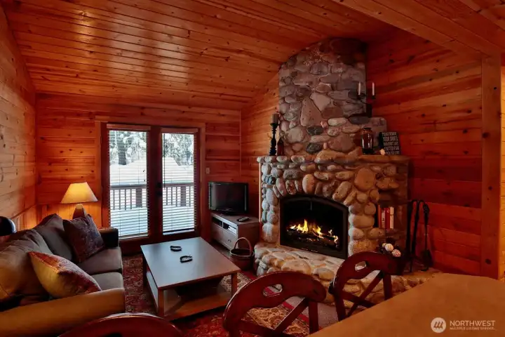 Additional living area with River Rock fireplace