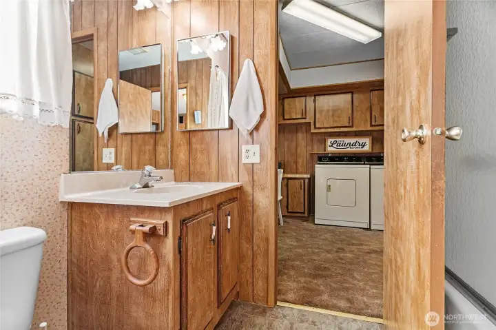 Full bathroom off the 2nd bedroom and laundry room