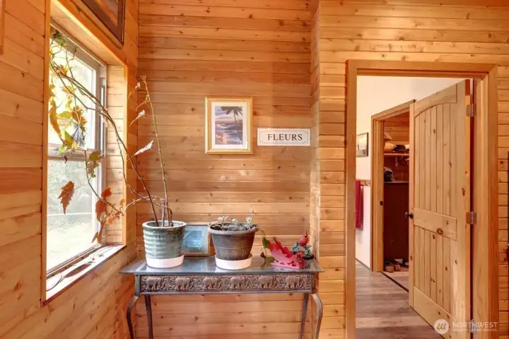 Moving over to the Primary Suite on the south side of the house, is the entrance to the Primary bath.