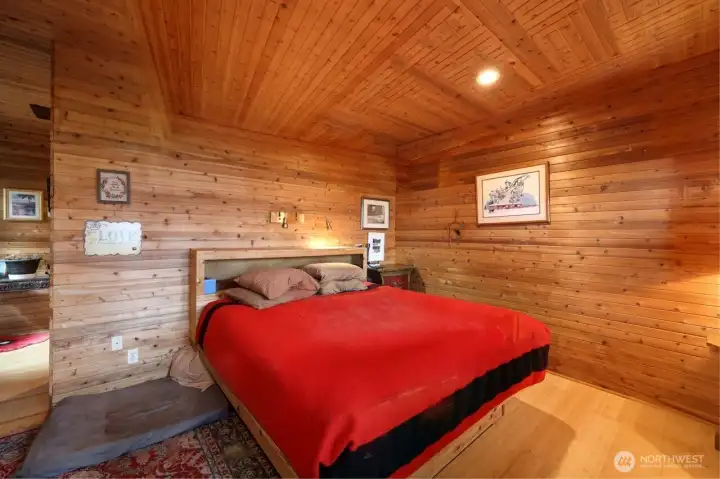 King size bed fits comfortably in this space.