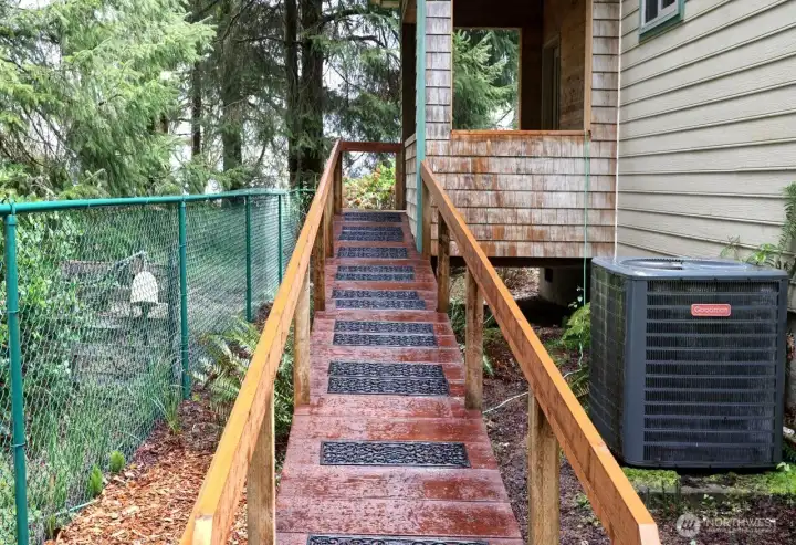 Wheelchair ramp leading to the private porch.