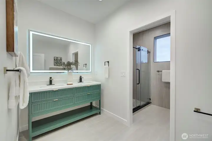 Primary bathroom with antifog mirror & radiant floor heat