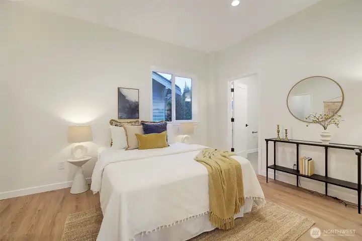 Bedroom #4 has an en suite bathroom and is on the main floor