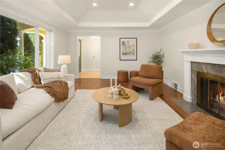 Inviting living room layered in warmth, light, and comfort.