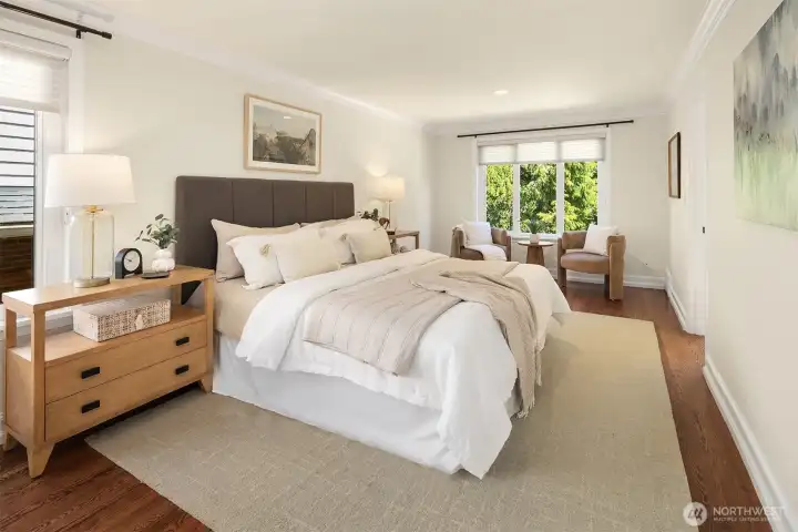 Primary bedroom with soft light and tranquil feel