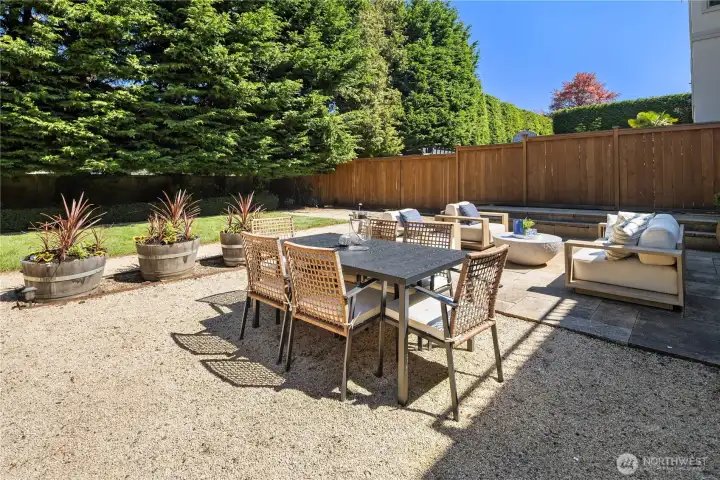 A generous outdoor setting with future potential to reimagine the grounds, including the possibility of a pool or DADU.