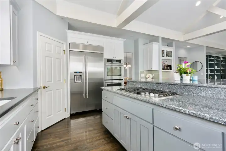Stainless steel appliances and custom cabinets