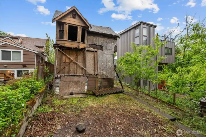 Backyard and Back of home showing Bay Window