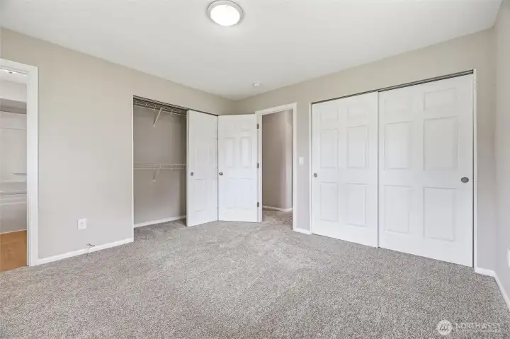 The primary bedroom has double closets