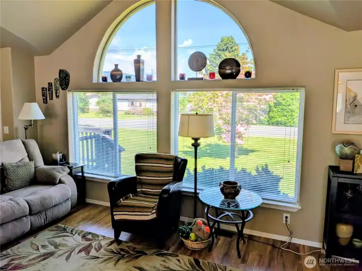 Large window fills the room with light.