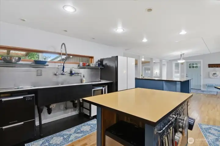 Kitchen showing commercial sink