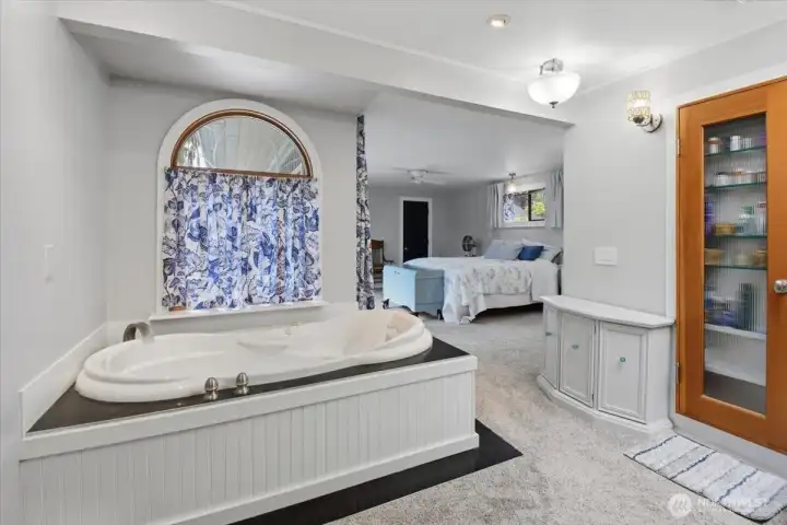 Primary bedroom with jetted tub