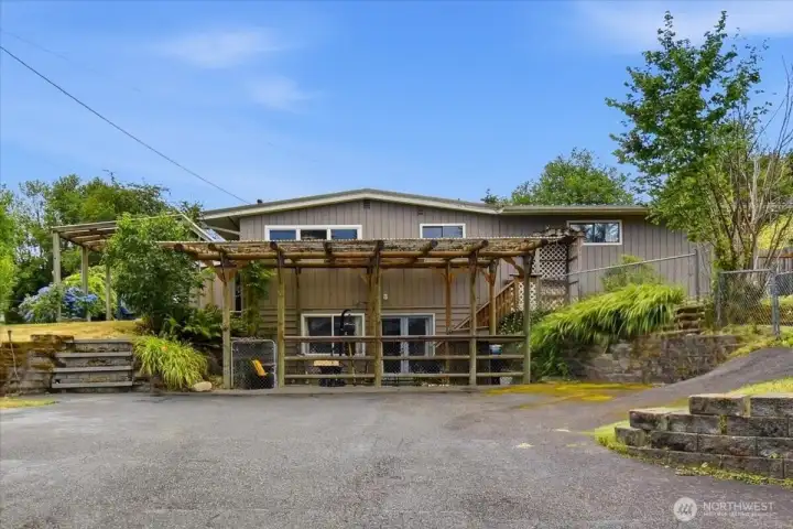 Lower level driveway and covered patio