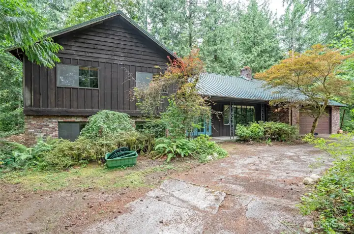 Original 1971 home offers a rare opportunity to renovate, refresh, and make it your own on a desirable level lot in Mirrormont.