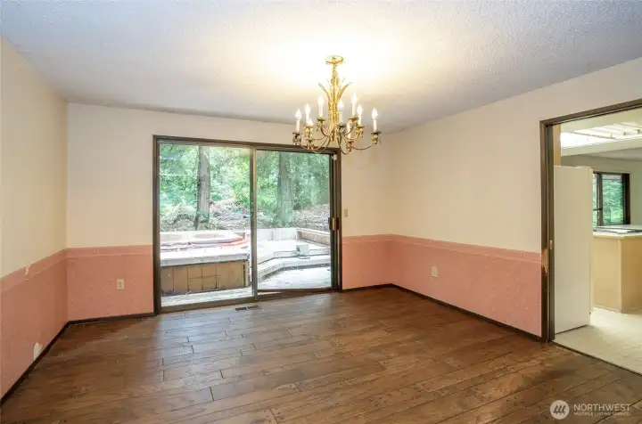 Dining area conveniently located just off the kitchen with direct access to the back deck—ideal for indoor-outdoor entertaining.