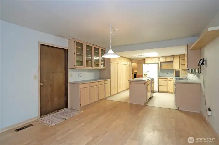 Family room offers a great open view into the kitchen and adjoining eating space.