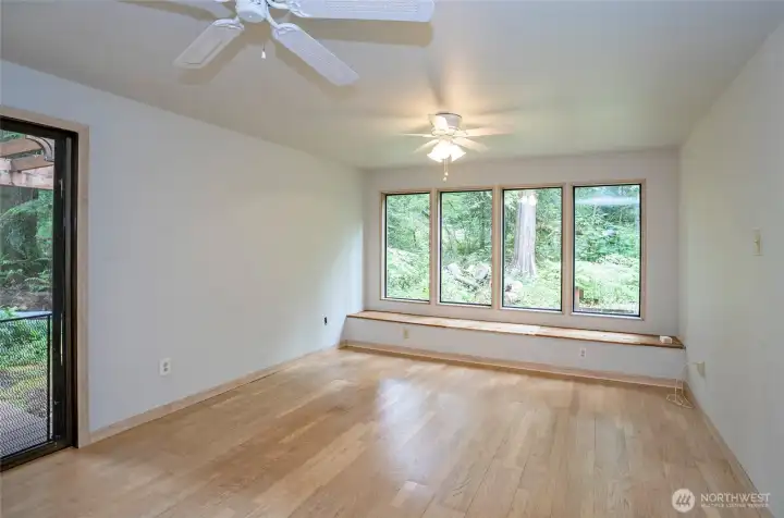 Built-in bench seating with serene views of the natural setting—perfect for relaxing and unwinding.