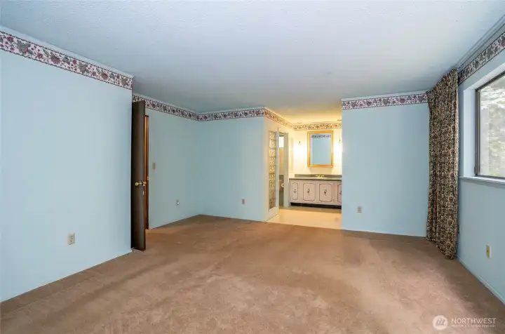 Alternate view of the primary suite and ¾ bath.