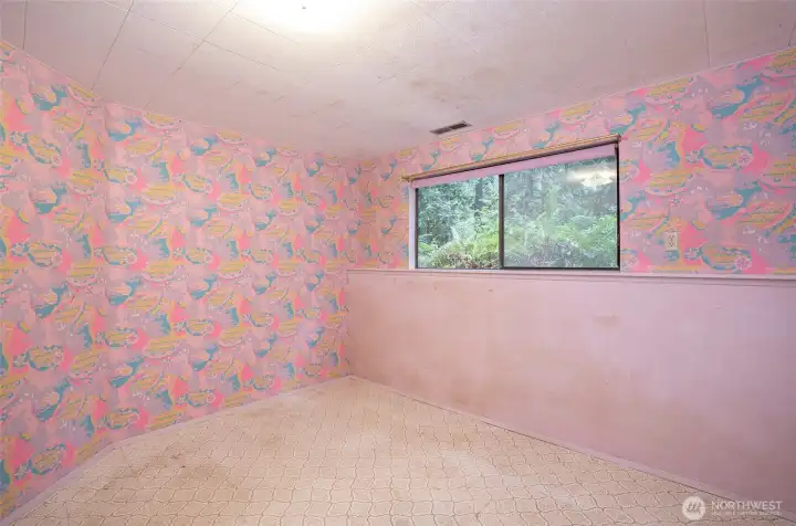 Second lower-level guest suite offering flexibility and privacy.