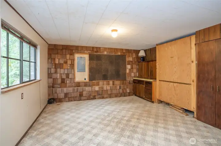 Different view of the lower-level recreation room with added living flexibility.