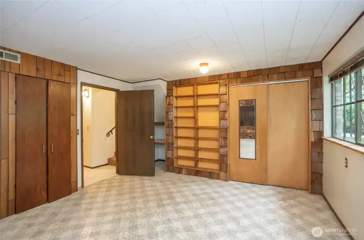 Lower-level recreation room with endless possibilities for use and customization.