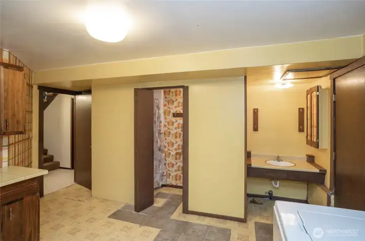 Convenient private ¾ bath located off the lower-level utility room.