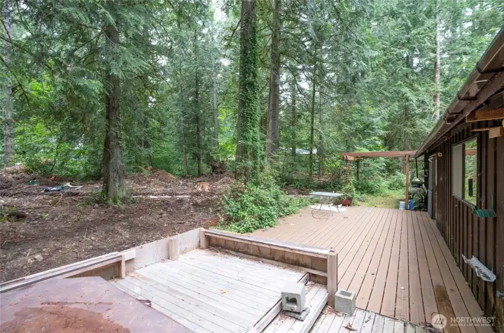 Deck off the dining and family areas offering added privacy and serene natural surroundings.