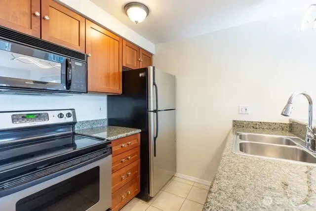 Great space in this kitchen plus you have a view from the kitchen sink!