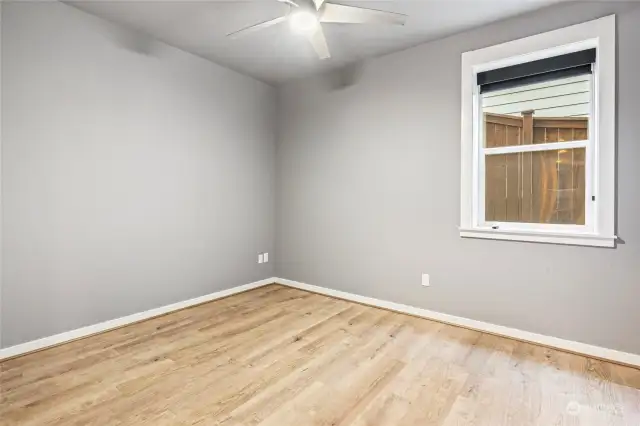 Spacious lower level bedroom.