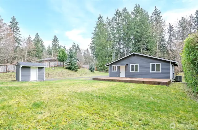 The backyard showcases a thoughtfully designed layout for low-maintenance upkeep and enjoyment.