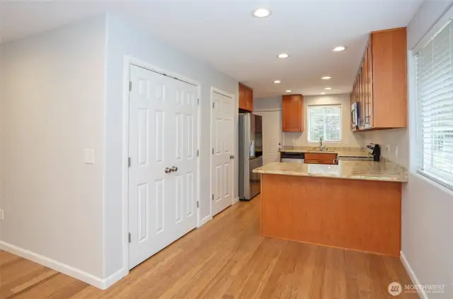 Dining area featuring a convenient eating bar, perfect for casual meals or entertaining guests.