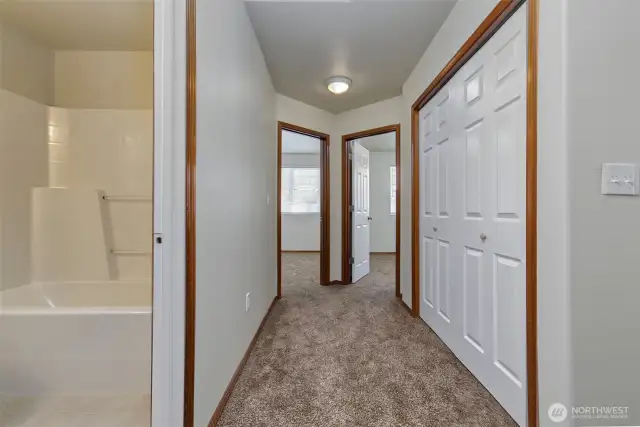 Hallway to two more bedrooms