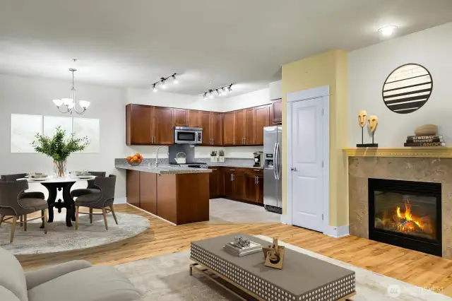 Enjoy level access to your lovely unit with fresh new flooring & desirable great room layout!