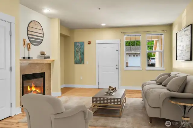 Gather around the cozy gas fireplace with upscale tile surround.