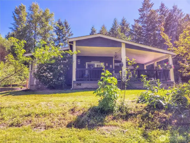 Vaulted, covered porch is sited to take in the views.