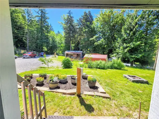 View from covered porch looking toward property entry.