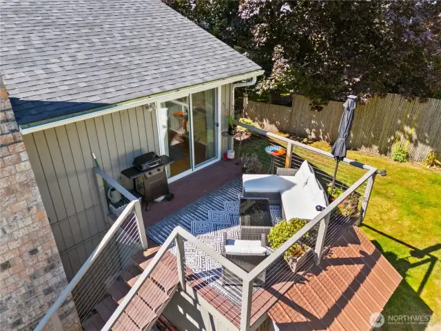 View of the private deck space off the back side of the home.