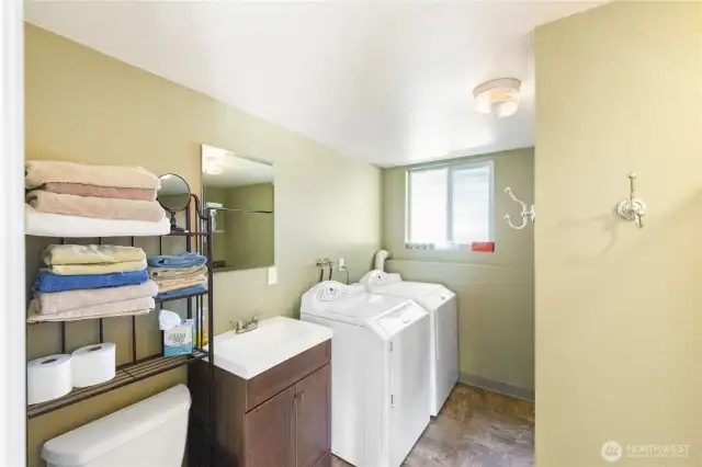 Lower level laundry and 3/4 bath.